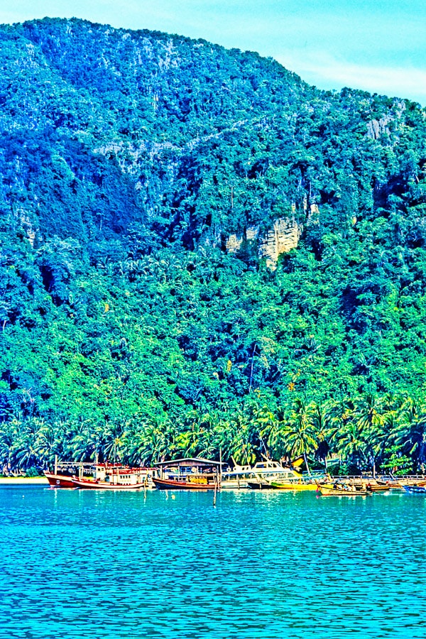 Morning in Ton Sai Bay 2 Boats are moored a the jetty in Ton Sai Bay, Koh Phi Phi Don, Thailand