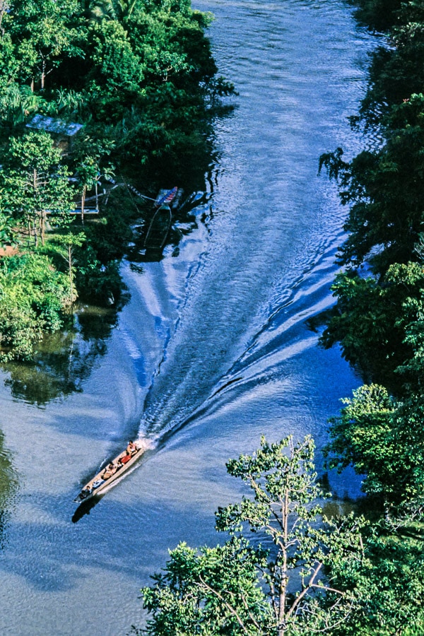 A longboat heading downriver in the Gunung Mulu National Park. 1989.